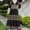 Elegant Patterned Maxi Dress with Flared Sleeves