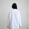 White shirt with details of festo
